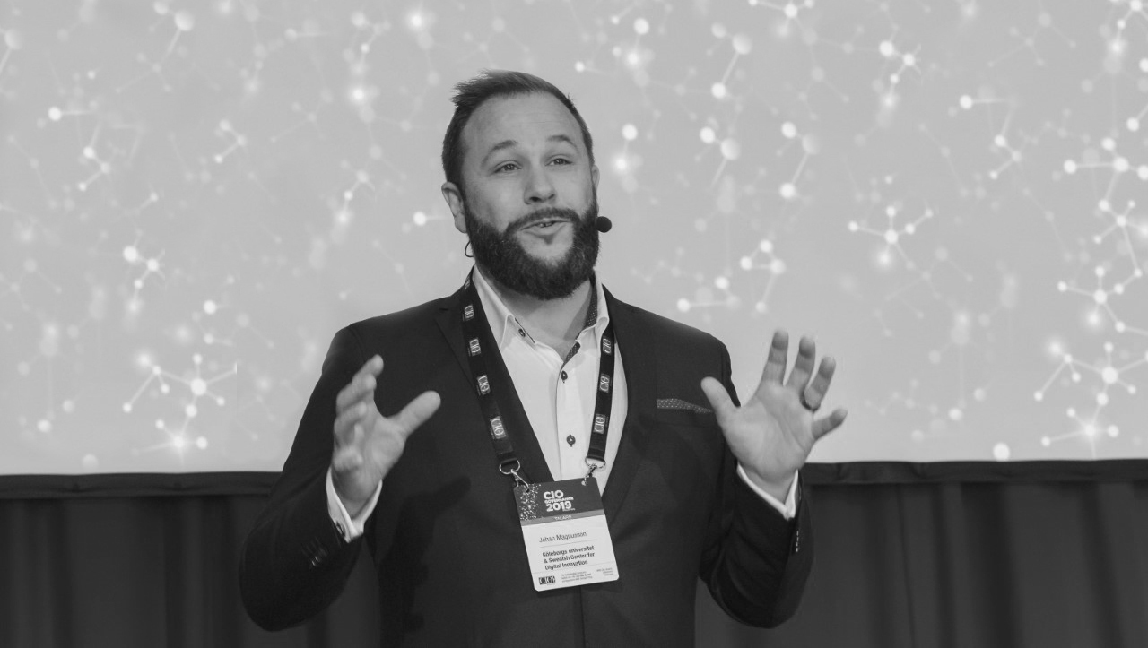 Person i föreläsningssituation.